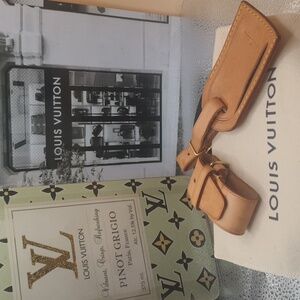 Louis Vuitton Luggage Tag and Poignet. *Authentic *